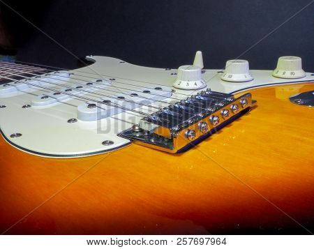 Electric Guitar Light Brown With Dark Sides With Light Inserts And Neck With Steel Strings
