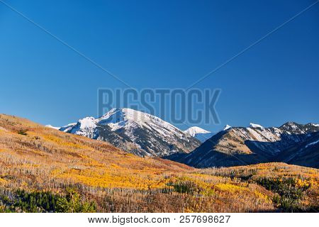 Autumn landscape at Kebler Pass in Colorado Rocky Mountains, USA. 