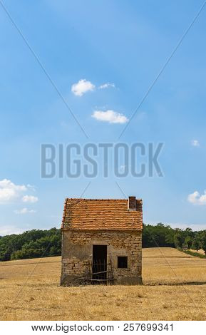 Lonely, Old Shed On A Corn Field In Summer In The Morvan, France.
