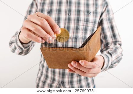 Businessman Holding Bitcoin. Golden Bitcoin Coin In Men Hands, Pened Wallet. Virtual Currency. Crypt