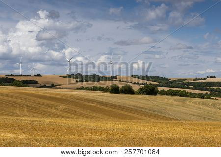 Windmills In The Countryside, Horizon Pollution, Near Auxerre, France.