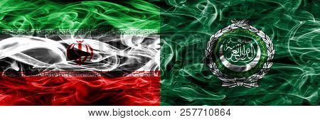 Iran Vs Arab League Smoke Flags Placed Side By Side. Thick Colored Silky Smoke Flags Of Iranian And 