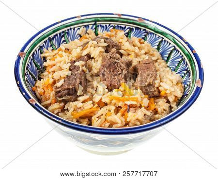 Above View Of Prepared Pilaf (central Asian Dish From Rice With Meat And Vegetable) In Traditional C