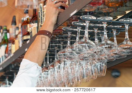 The Waiter Takes A Bottle Of Whiskey