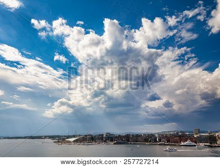 Dramatic stormy sky over Aker Brygge area in Central Oslo, Norway, Scandanavia