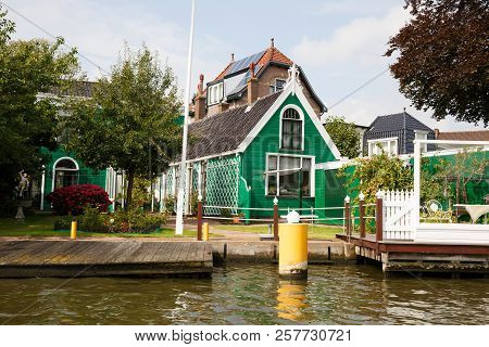 Traditional, Authentic Dutch Houses At The Canal.