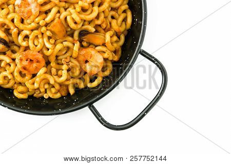 Traditional Spanish Fideua. Noodle Paella Isolated On White Background. Top View
