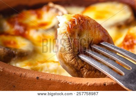Georgian Cuisine: Close Up Mushrooms Baked With Cheese Suluguni On Ketsi