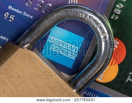 Morgantown, Wv - 11 September 2018: Macro Of Credit Cards With Brass Lock And Focus On American Expr