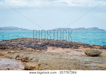 Saaidia Island And Waves And Rocks