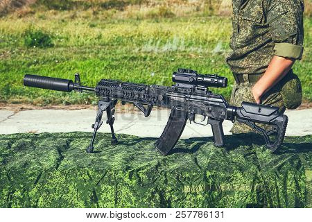 The Upgraded Kalashnikov Ak47 Assault Rifle On Bipods With Tactical Accessories, An Optical Sight An