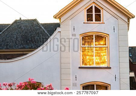 Great Beautiful Atmospheric Golden Reflection Of The Sunset In The Window Of A Monumental Building W