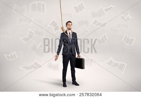 Young burnout businessman with flying documents concept