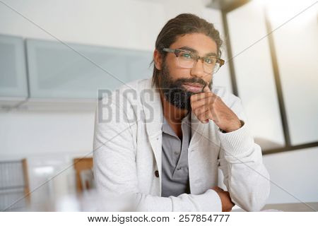 Portrait of bearded man with eyglasses