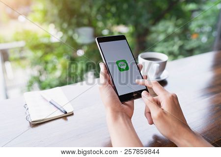 Chiang Mai, Thailand - August 18,2018: Woman Hands Holding Huawei With Line Apps On Screen. Line Is