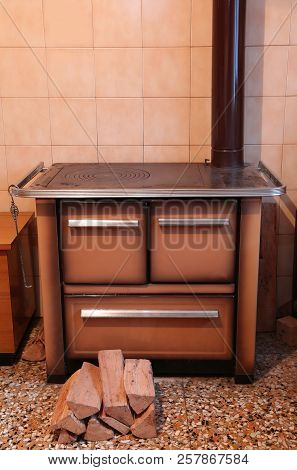Old Wood-burning Stove Inside The Kitchen Of The Home In Mountain