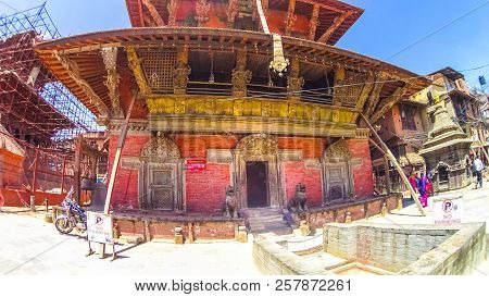 Patan, Nepal - April 13, 2018: People Going At Street In Patan, Ancient City In Kathmandu Valley. Hi