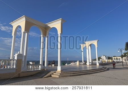 Evpatoria, Crimea, Russia - June 30, 2018: Colonnade On The Gorky Embankment In The Resort Town Of E