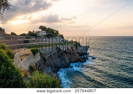 Quaint Costal Landscape In Evening Sunlight On Balearic Island Of Mallorca, Spain