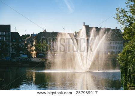 Strasbourg, France - Sep 12, 2018: View To The Fountain Early In The Morning On The Canal Des Faux R