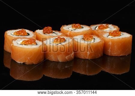 Various Sushi, Rolls On A Black Background With Reflection. Especially For Cafes And Restaurants On 