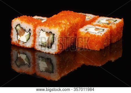 Various Sushi, Rolls On A Black Background With Reflection. Especially For Cafes And Restaurants On 