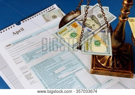 Law Concept Scales Of Justice Criminal Liability For Non-payment Of Taxes Of One Hundred Dollars Bil