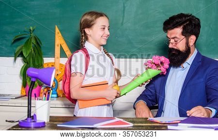 Teachers Day. Daugghter And Father With Flowers. Back To School. Happy Teachers Day. Knowledge Day I