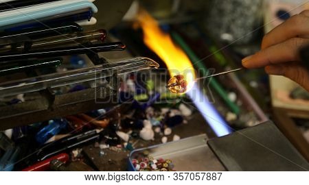 Warm Flame Used By The Vetraio Artist While Modeling The Glass