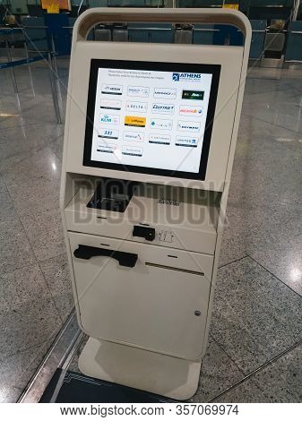 Athens, Greece - February, 11 2020: A Self Service Check-in Machine For Check In And Printing Boardi