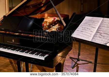 Perm, Russia - March 18, 2020: Grand Piano Steinway & Sons And Score For Violinist On Stage In The C