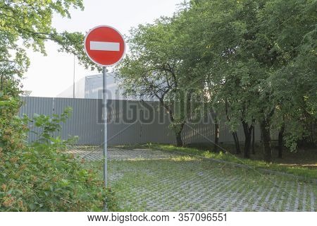 Road Sign Stop. No Entry. High Fence, Closed Territory. Quarantine, Epidemic, Viral Disease. Bright 
