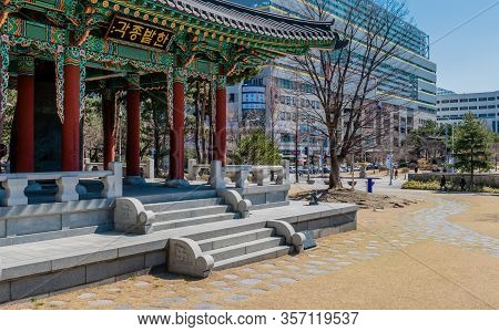 Daejeon, South Korea; March 16, 2020: Side Perspective View Of Ceremonial Bell In Oriental Pavilion 
