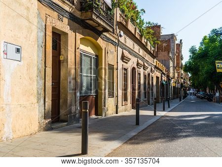 Barcelona, Spain - August 4, 2019: Colorful Houses In Eixample Neighborhood