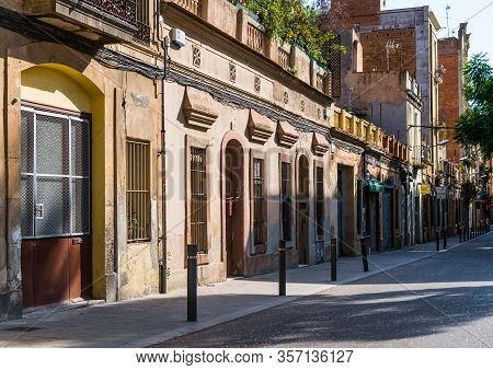 Barcelona, Spain - August 4, 2019: Colorful Houses In Eixample Neighborhood