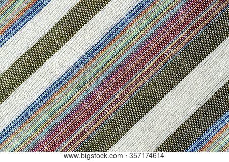 Background From Vintage Natural Linen Fabric. Flax Texture. Striped Colorful Linen Fabric. Canvas Te