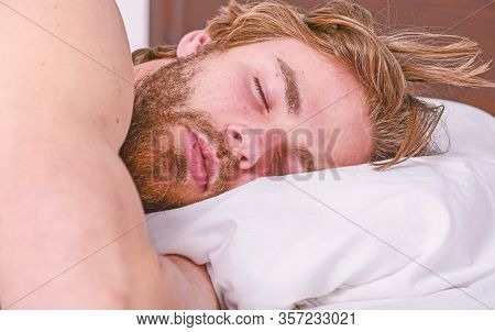 Get Adequate And Consistent Amount Of Sleep Every Night. Expert Tips On Sleeping Better. Bearded Man