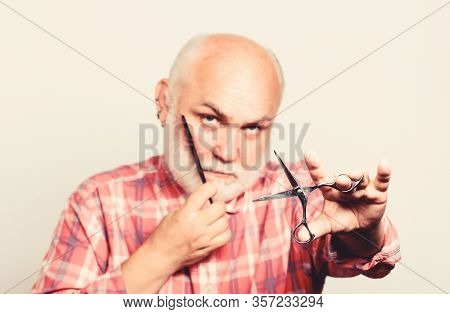 Close Up Of Man Shaving. Shaving Scissors Tool Kit. Cut And Brush Hair. Mature Bearded Man Isolated 