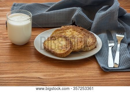 French Toast - Przenice - Slices Of Bread Soaked In Beaten Eggs And Milk And Fried, With A Glas Of Y