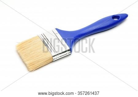 Blue Paint Brush On An Isolated White Background