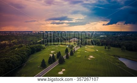 Sunny Summer Day Over Green Islands On A River In A Northern City - Aerial Flight
