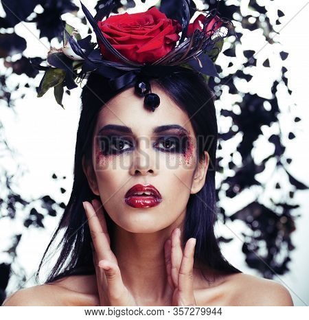Pretty Brunette Woman With Rose Jewelry, Black And Red, Bright Make Up Kike A Vampire Closeup Red Li