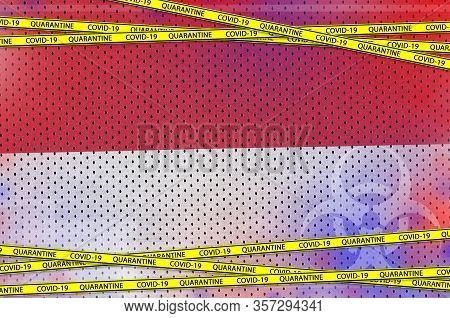 Indonesia Flag And Covid-19 Quarantine Yellow Tape. Coronavirus Or 2019-ncov Virus Concept