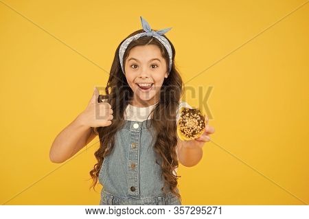 Must Try. Delicious Cupcake. Gluten Free Recipe. Homemade Muffin. Happy Childhood. Kid Girl Hold Gla
