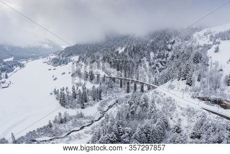 Aerial View Of The Landwasser Viaduct With Railway Without Famous Train At Winter, Landmark Of Switz