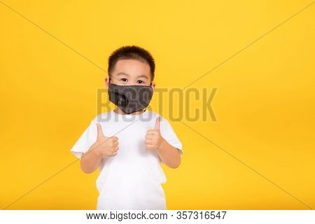 Little Asian Children Boy Wearing Medical Mask Protection Coronavirus Covid-19 Or Dust Pm2.5 Tumbs U
