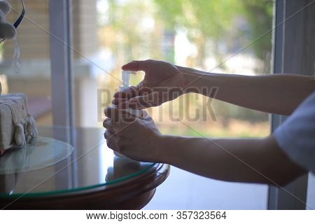 Rubbing Hands With Alcohol Gel To Kill Bacteria And Viruses. Washing Hands With Sanitizer To Repel T