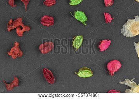 Potpourri On A Black Background. Flavored Potpourri Leaves. Dry Potpourri Leaves Close-up. Geometric