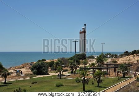 Matalascanas, Spain - July 10, 2011:lighthouse On The Atlantic Ocean In Matalascanas