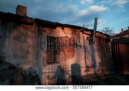Detail Of An Abandoned Building In Evening Sky Landscape
